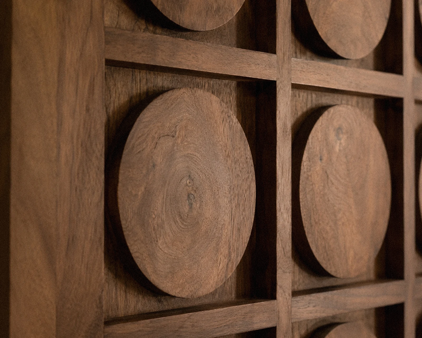 Carved disc-relief detail